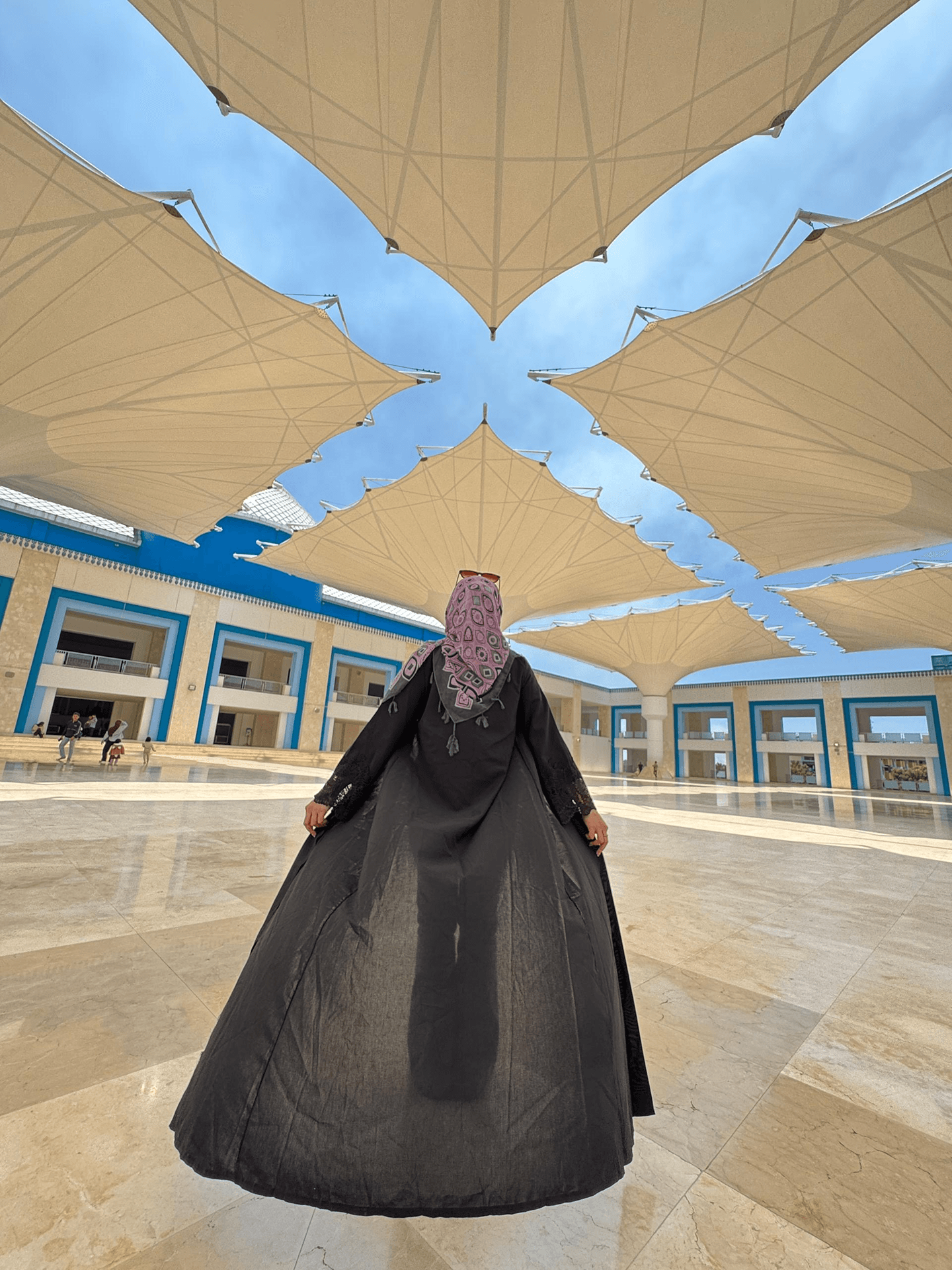 Mosque courtyard with large shade umbrellas